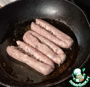 Нут с колбасками и лимонной зеленью